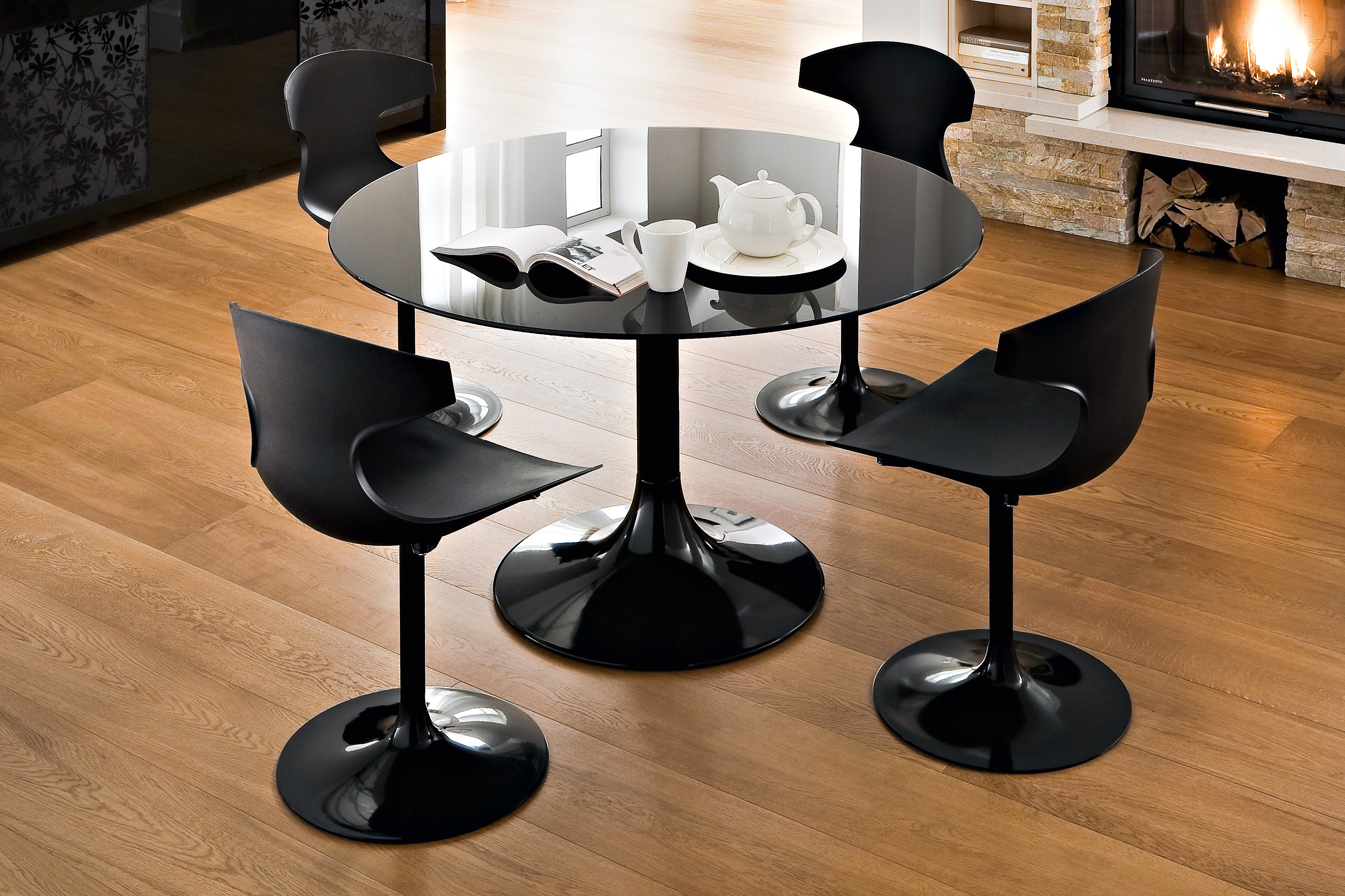 small round black kitchen table and chair